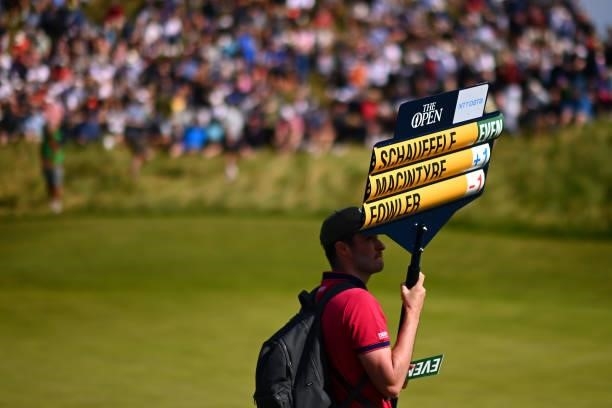 Walking scoreboard carrier is seen during Day One of The 149th Open at Royal St George’s Golf Club on July 15, 2021 in Sandwich, England.