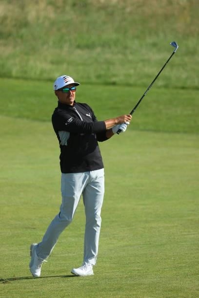 Rickie Fowler of the United States plays a second shot on the ninth hole during Day One of The 149th Open at Royal St George’s Golf Club on July 15,...