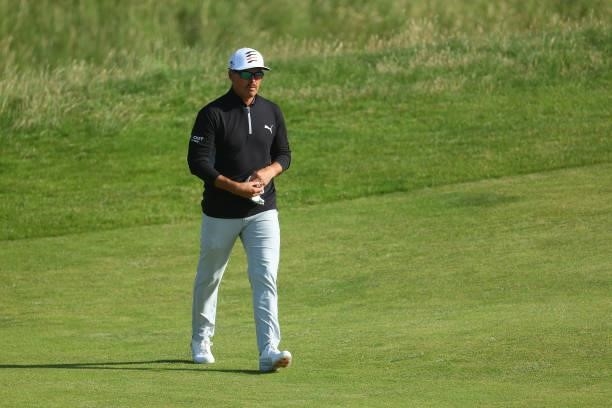 Rickie Fowler of the United States walks the ninth hole during Day One of The 149th Open at Royal St George’s Golf Club on July 15, 2021 in Sandwich,...