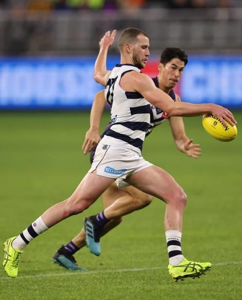 Sam Menegola of the Cats in action during the round 18 AFL match between the Fremantle Dockers and Geelong Cats at Optus Stadium on July 15, 2021 in...