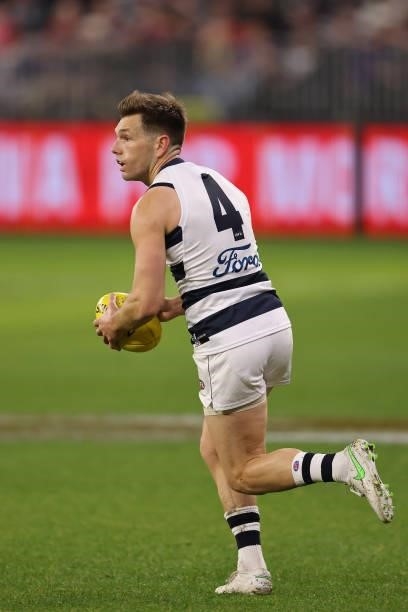Shaun Higgins of the Cats in action during the round 18 AFL match between the Fremantle Dockers and Geelong Cats at Optus Stadium on July 15, 2021 in...