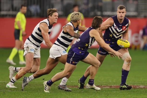 Sean Darcy of the Dockers looks to handball during the round 18 AFL match between the Fremantle Dockers and Geelong Cats at Optus Stadium on July 15,...