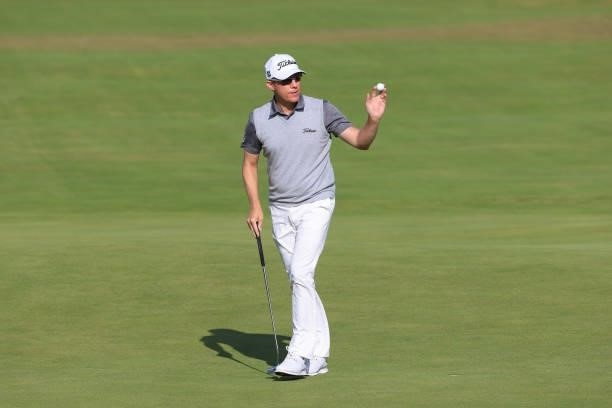 Brad Kennedy of Australia waves on the 18th green during Day One of The 149th Open at Royal St George’s Golf Club on July 15, 2021 in Sandwich,...