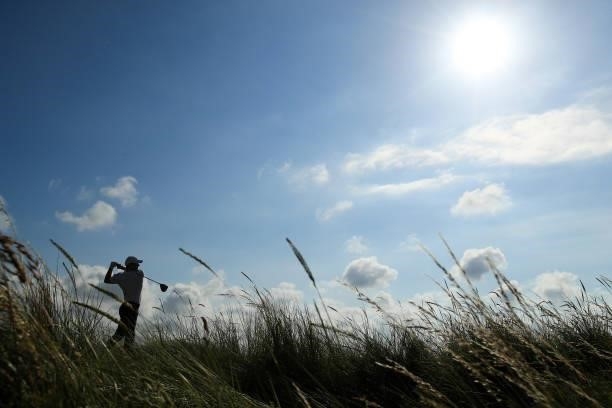 Rory McIlroy of Northern Ireland plays his shot from the ninth tee during Day One of The 149th Open at Royal St George’s Golf Club on July 15, 2021...