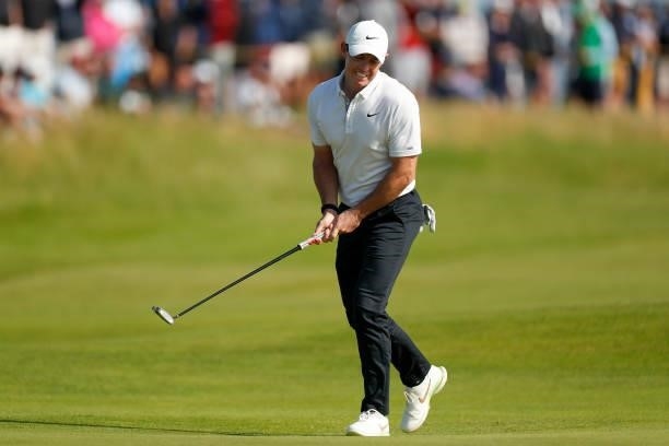 Rory McIlroy of Northern Ireland putts a shot on the seventh hole during Day One of The 149th Open at Royal St George’s Golf Club on July 15, 2021 in...