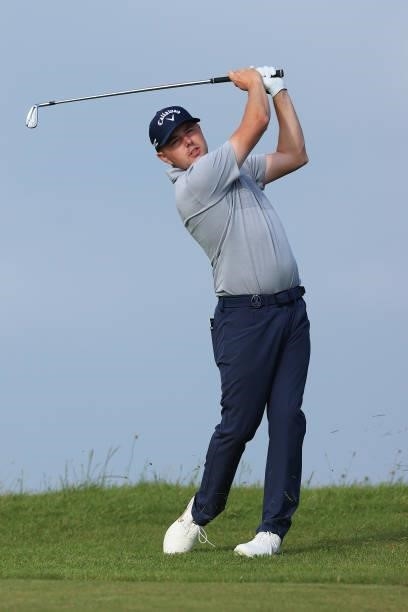 Ben Hutchinson of England plays his second shot on the 8th hole during Day One of The 149th Open at Royal St George’s Golf Club on July 15, 2021 in...
