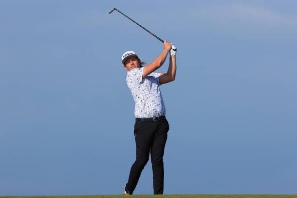 Cameron Smith of Australia plays his second shot on the 8th hole during Day One of The 149th Open at Royal St George’s Golf Club on July 15, 2021 in...
