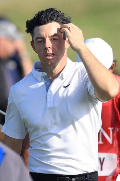 Rory McIlroy of Northern Ireland reacts on the 9th tee during Day One of The 149th Open at Royal St George’s Golf Club on July 15, 2021 in Sandwich,...