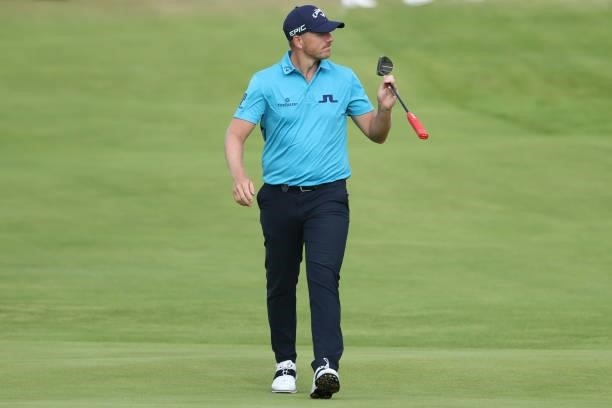Matt Wallace of England reacts on the 18th green during Day One of The 149th Open at Royal St George’s Golf Club on July 15, 2021 in Sandwich,...