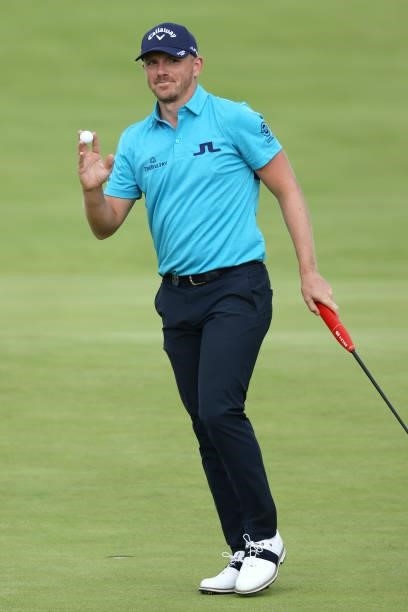 Matt Wallace of England reacts on the 18th green during Day One of The 149th Open at Royal St George’s Golf Club on July 15, 2021 in Sandwich,...