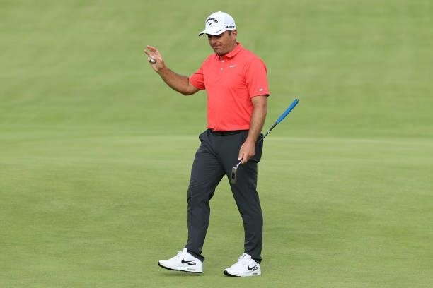 Francesco Molinari of Italy acknowledges the crowd on the 18th green during Day One of The 149th Open at Royal St George’s Golf Club on July 15, 2021...