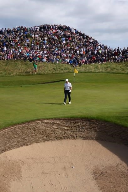 Rory McIlroy of Northern Ireland walks on the 8th green during Day One of The 149th Open at Royal St George’s Golf Club on July 15, 2021 in Sandwich,...