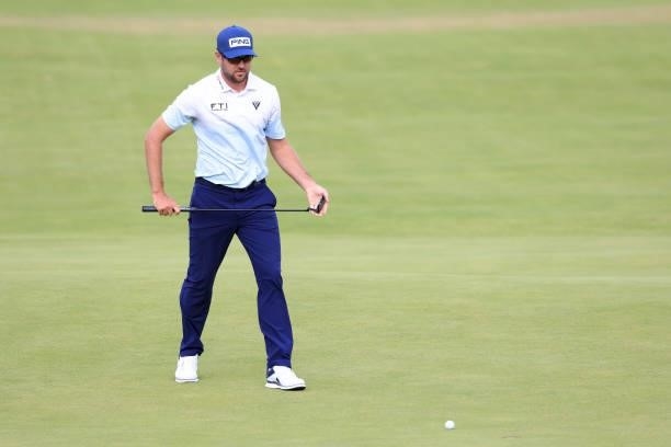 Corey Conners of Canada lines up a putt on the 18th green during Day One of The 149th Open at Royal St George’s Golf Club on July 15, 2021 in...