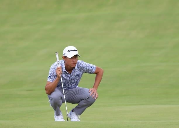 Collin Morikawa of the United States lines up a putt on the 18th green during Day One of The 149th Open at Royal St George’s Golf Club on July 15,...