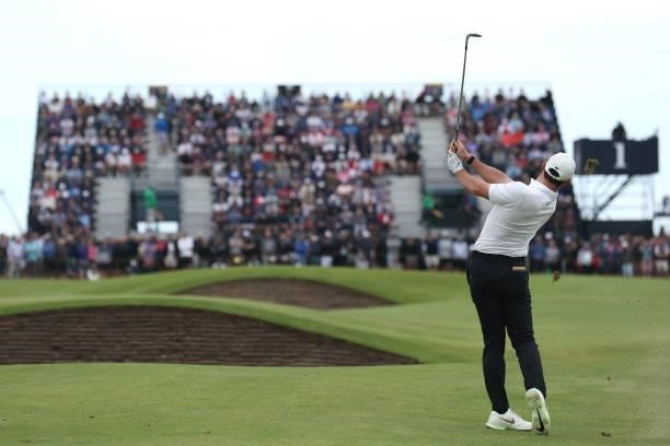 Rory McIlroy of Northern Ireland plays his second shot on the 1st hole during Day One of The 149th Open at Royal St George’s Golf Club on July 15,...