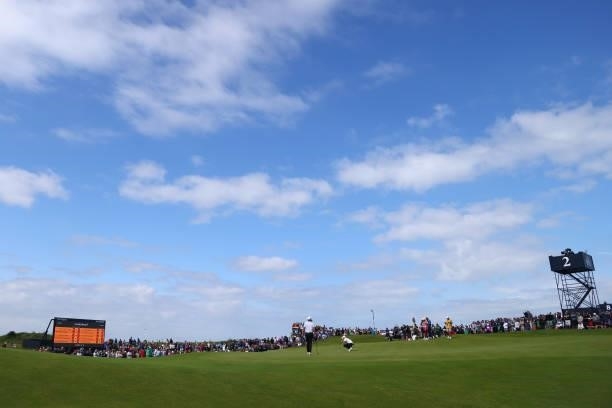 Rory McIlroy of Northern Ireland lines up a putt on the 2nd green during Day One of The 149th Open at Royal St George’s Golf Club on July 15, 2021 in...