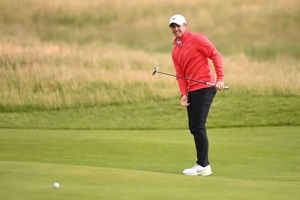 Rory McIlroy of Northern Ireland putts on the 11th green during Day One of The 149th Open at Royal St George’s Golf Club on July 15, 2021 in...