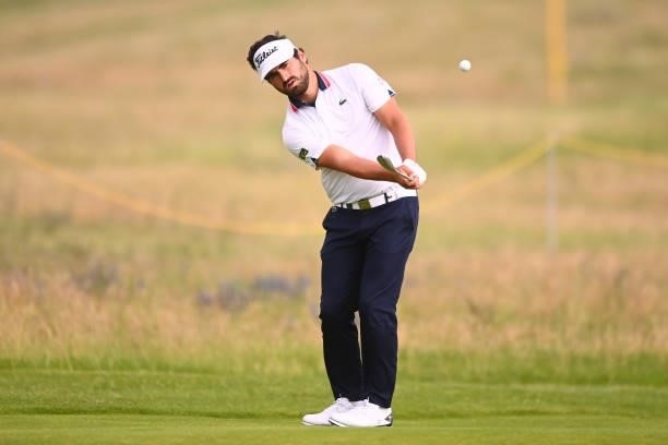 Antoine Rozner of France plays his second shot on the 11th hole during Day One of The 149th Open at Royal St George’s Golf Club on July 15, 2021 in...