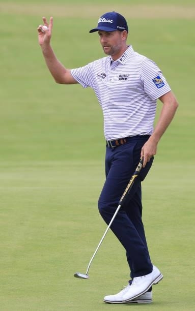 Webb Simpson of the United States acknowledges the crowd on the 18th green during Day One of The 149th Open at Royal St George’s Golf Club on July...