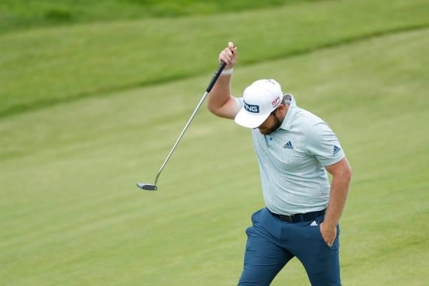 Tyrrell Hatton of England reacts on the 18th hole during Day One of The 149th Open at Royal St George’s Golf Club on July 15, 2021 in Sandwich,...