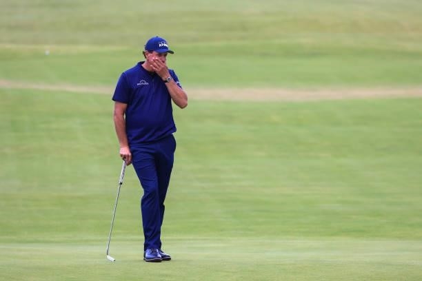 Phil Mickelson of the United States reacts on the 18th green during Day One of The 149th Open at Royal St George’s Golf Club on July 15, 2021 in...