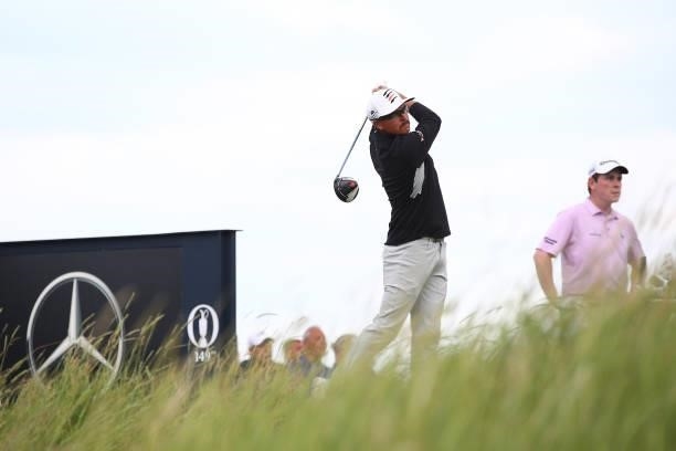 Rickie Fowler of the United States plays his shot from the 18th tee during Day One of The 149th Open at Royal St George’s Golf Club on July 15, 2021...