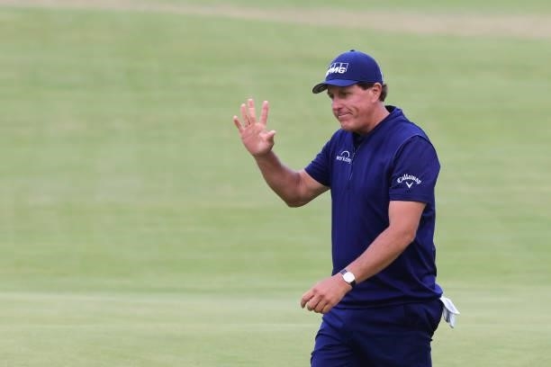 Phil Mickelson of the United States waves as he walks off the 18th green during Day One of The 149th Open at Royal St George’s Golf Club on July 15,...