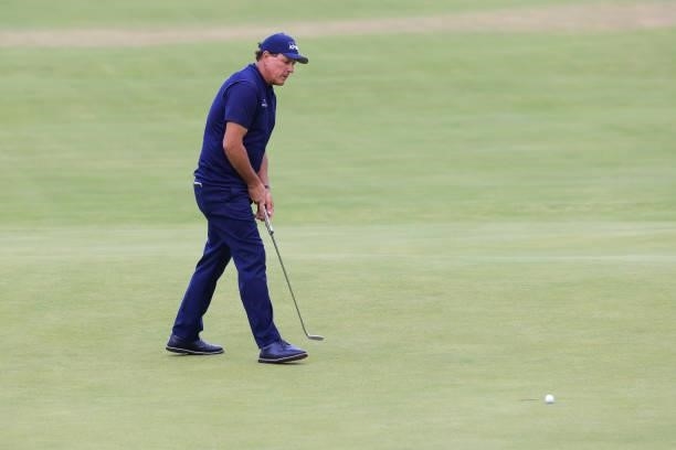 Phil Mickelson of the United States reacts to his putt on the 18th green during Day One of The 149th Open at Royal St George’s Golf Club on July 15,...
