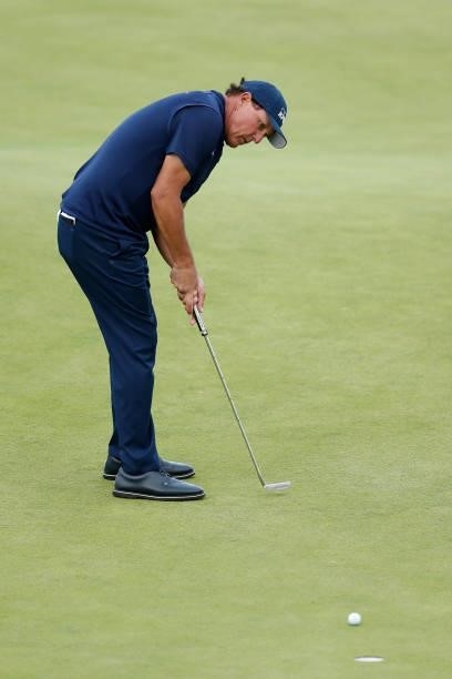 Phil Mickelson of the United States misses his putt for par on the 18th green during Day One of The 149th Open at Royal St George’s Golf Club on July...