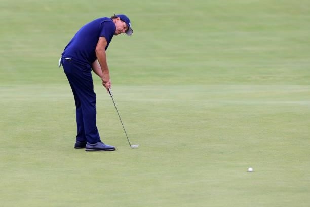 Phil Mickelson of the United States misses his putt for par on the 18th green during Day One of The 149th Open at Royal St George’s Golf Club on July...