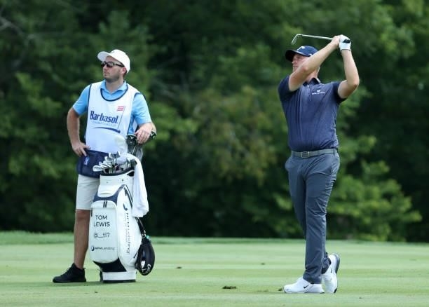 Tom Lewis of England plays his second shot on the 17th hole during the first round of the Barbasol Championship at Keene Trace Golf Club on July 15,...