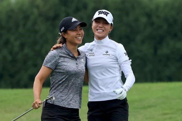 Danielle Kang and Lydia Ko of Australia celebrate an eagle on the 11th hole during the second round of the Dow Great Lakes Bay Invitational at...