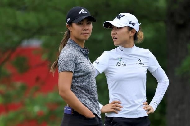 Danielle Kang and Lydia Ko of Australia wait on the 11th hole during the second round of the Dow Great Lakes Bay Invitational at Midland Country Club...
