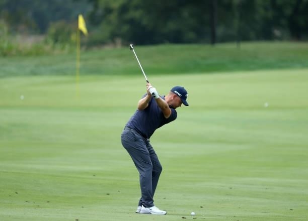 Tom Lewis of England plays his second shot on the first hole during the first round of the Barbasol Championship at Keene Trace Golf Club on July 15,...