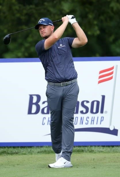 Tom Lewis of England plays his shot from the first tee during the first round of the Barbasol Championship at Keene Trace Golf Club on July 15, 2021...