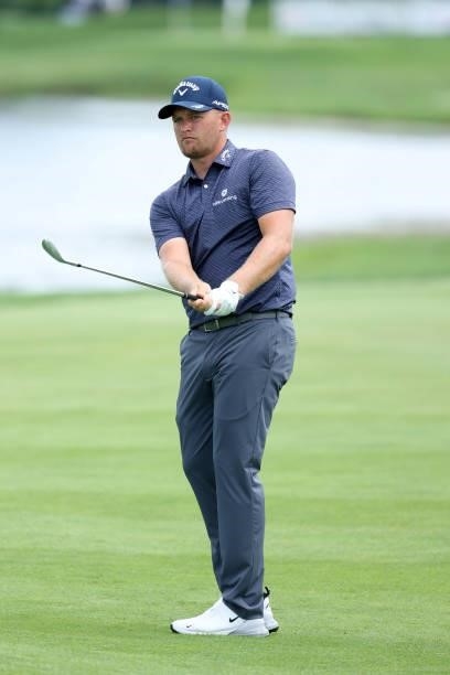 Tom Lewis of England plays his third shot on the 18th hole during the first round of the Barbasol Championship at Keene Trace Golf Club on July 15,...