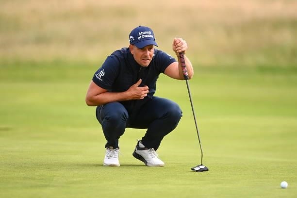 Henrik Stenson of Sweden lines up a putt on the 11th green during Day One of The 149th Open at Royal St George’s Golf Club on July 15, 2021 in...