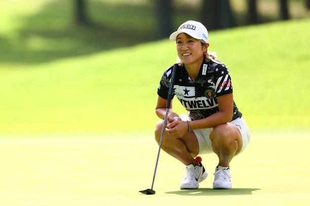 Asako Fujimoto of Japan lines up a putt on the 11th green during first round of the GMO Internet Ladies Samantha Thavasa Global Cup at Eagle Point...