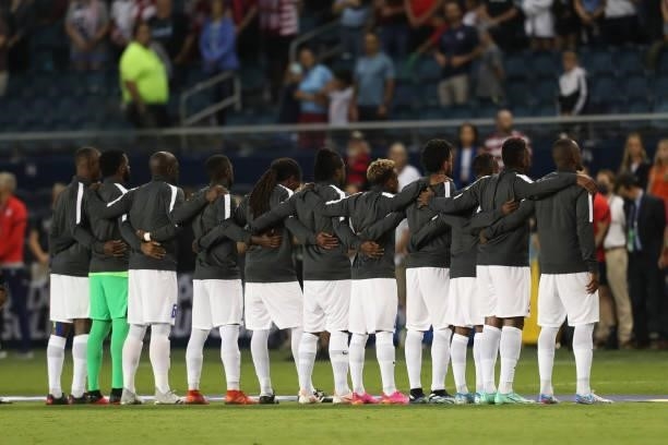 Martinique players stand for their national anthem before the Group B match between Martinique and United States as part of the 2021 CONCACAF Gold...