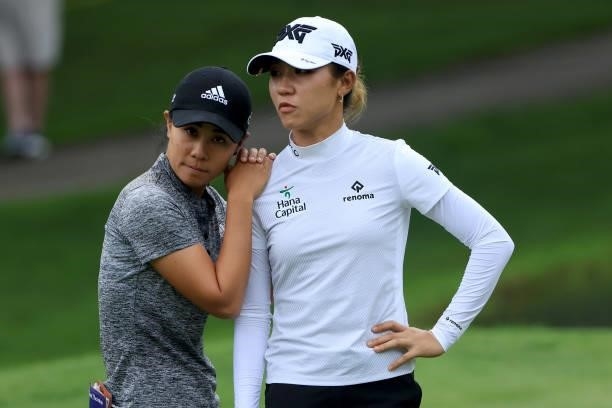 Danielle Kang and Lydia Ko of Australia react after a birdie on the fifth hole during the second round of the Dow Great Lakes Bay Invitational at...