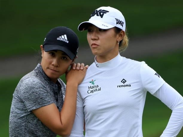 Danielle Kang and Lydia Ko of Australia react after a birdie on the fifth hole during the second round of the Dow Great Lakes Bay Invitational at...