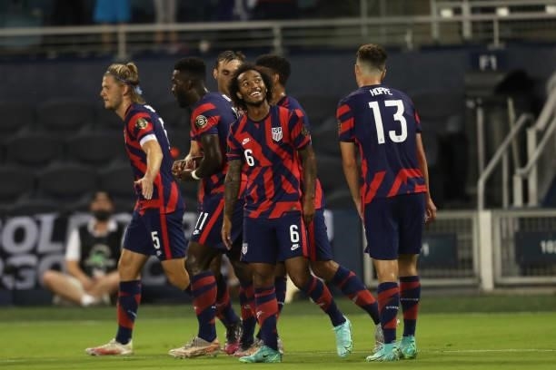 Gianluca Busio of United States looks on during the celebration with his teammate after Daryl Dike scores the second goal during a Group B match...