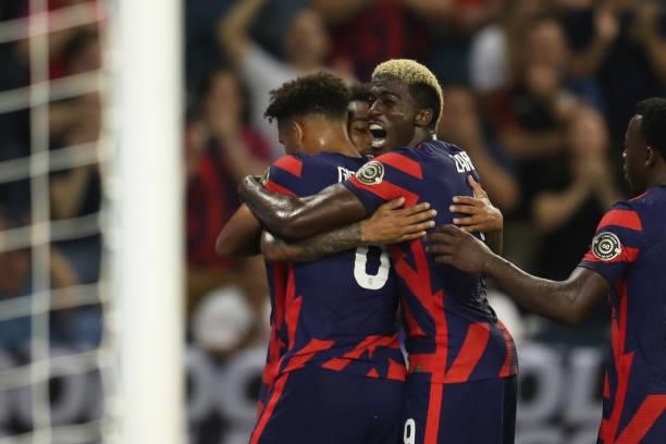 Gyasi Zardes of the United States celebrates with Nicholas Gioacchini after Gioacchini's goal during a Group B match between Martinique and United...