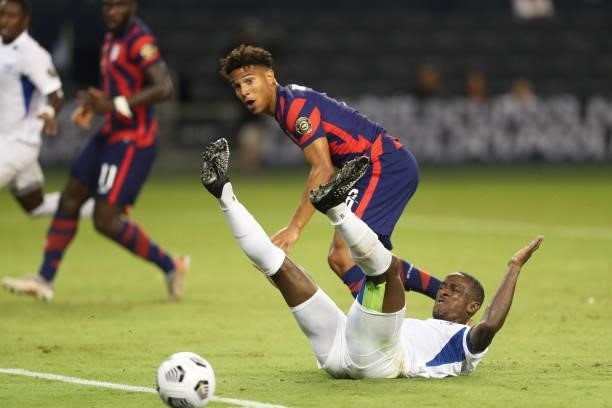 Nicholas Gioacchini of United States kicks the ball and scores a goal during a Group B match between Martinique and United States as part of the 2021...