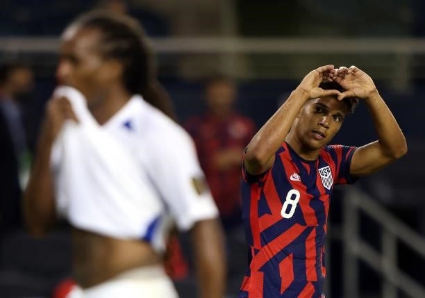 Nicholas Gioacchini of the United States reacts after scoring during the 2021 CONCACAF Gold Cup match against Martinique at Children's Mercy Park on...
