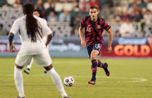 James Sands of the United States turns and moves with the ball during a game between Martinique and USMNT at Children's Mercy Park on July 15, 2021...