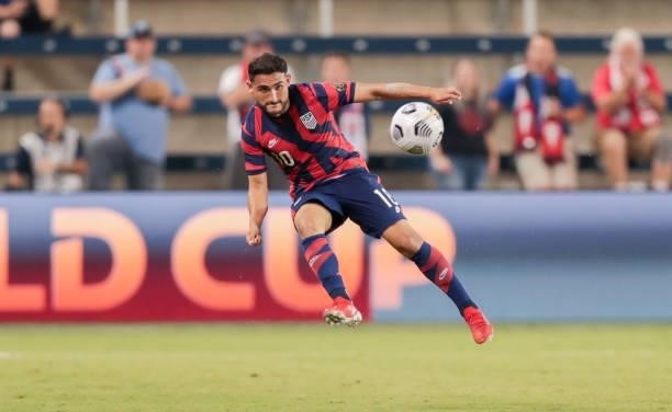 Cristian Roldan of the United States passes off the ball during a game between Martinique and USMNT at Children's Mercy Park on July 15, 2021 in...