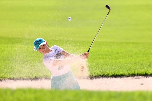 Yui Kawamoto of Japan hits out from a bunker on the 18th hole during first round of the GMO Internet Ladies Samantha Thavasa Global Cup at Eagle...