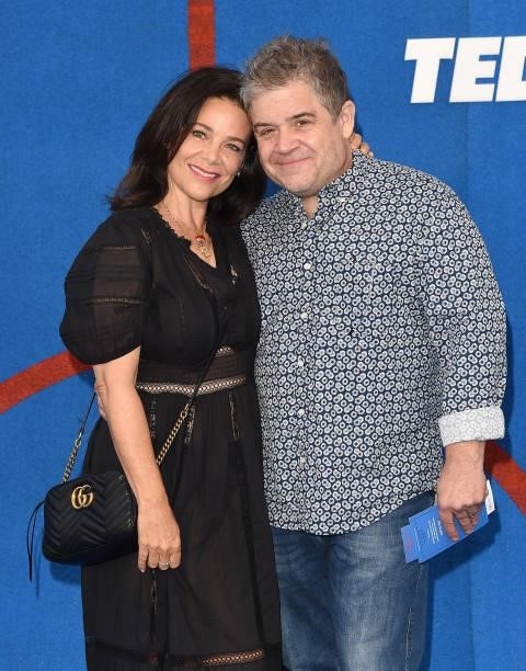 Meredith Salenger and Patton Oswalt attend Apple's "Ted Lasso