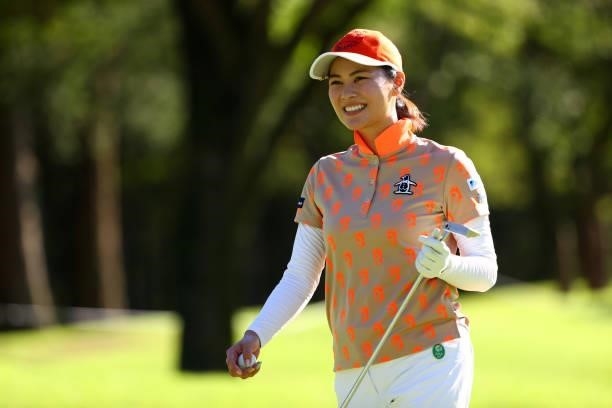 Hina Arakaki of Japan smiles after holing out on the 18th green during first round of the GMO Internet Ladies Samantha Thavasa Global Cup at Eagle...